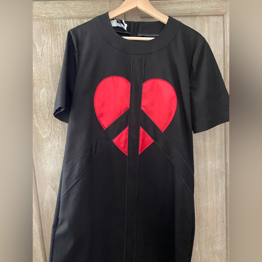 Black mini dress from MOSCHINO. Size Italian 44
